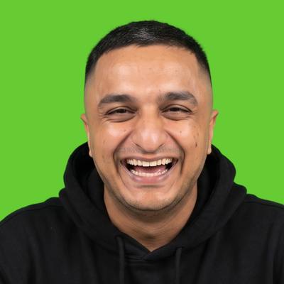 Matthew Truth smiling, wearing a black hoodie